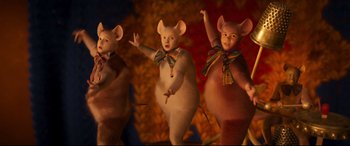 Movie still from “Cats” (2019), directed by Tom Hooper – A group of three mice that are standing in a row; Medium shot, High angle