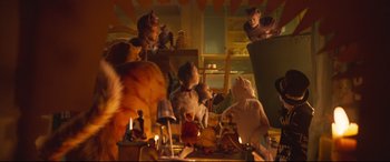 Movie still from “Cats” (2019), directed by Tom Hooper – A room filled with lots of stuffed animals and candles; Wide shot, Over the shoulder angle
