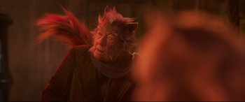 Movie still from “Cats” (2019), directed by Tom Hooper – A person wearing a cat mask and a sweater; Close Up shot, Over the shoulder angle