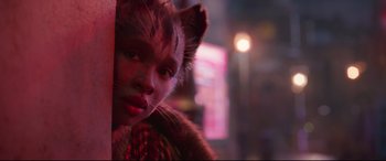 Movie still from “Cats” (2019), directed by Tom Hooper – A person with a cat's face; Close Up shot, High angle