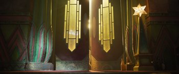 Movie still from “Cats” (2019), directed by Tom Hooper – A pair of stained glass windows in a room; Extreme Wide shot, Low angle