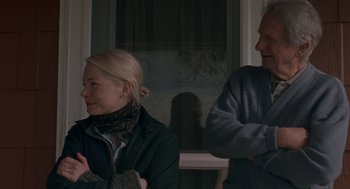 Movie still from “Certain Women” (2016), directed by Kelly Reichardt – A man and a woman sitting next to each other; Medium shot, Over the shoulder angle