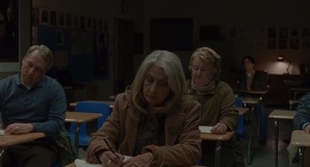 Movie still from “Certain Women” (2016), directed by Kelly Reichardt – Two older women sitting at a desk writing; Medium shot, Over the shoulder angle