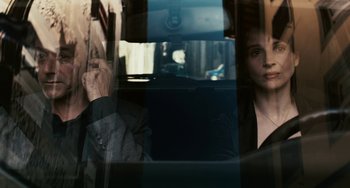 Movie still from “Certified Copy” (2010), directed by Abbas Kiarostami – A man and a woman sitting in a car; Close Up shot, Over the shoulder angle