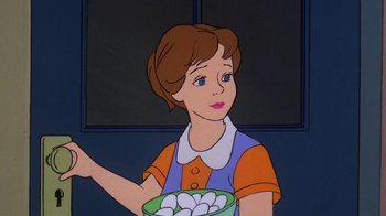 Movie still from “Charlotte's Web” (1973), directed by Iwao Takamoto – A woman is holding a bowl of eggs in front of a window; Medium shot, High angle