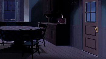 Movie still from “Charlotte's Web” (1973), directed by Iwao Takamoto – A dark room with a table and chairs and a bowl of fruit; Wide shot, High angle