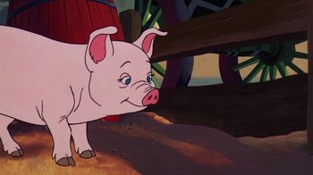 Movie still from “Charlotte's Web” (1973), directed by Iwao Takamoto – A pig standing next to a wooden fence; Close Up shot, High angle