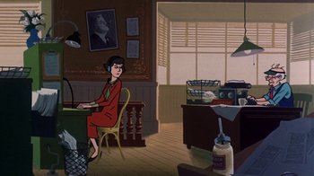 Movie still from “Charlotte's Web” (1973), directed by Iwao Takamoto – An animated woman sitting at a desk in front of a computer; Wide shot, High angle
