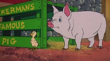 Movie still from “Charlotte's Web” (1973), directed by Iwao Takamoto – A pig standing next to a duck in front of a green fence; Medium shot, Low angle
