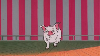 Movie still from “Charlotte's Web” (1973), directed by Iwao Takamoto – A pig standing on a wooden floor in front of a striped wall; Wide shot, Low angle