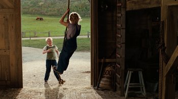 Movie still from “Charlotte's Web” (2006), directed by Gary Winick – A woman and a child are swinging on a rope; Wide shot, Over the shoulder angle