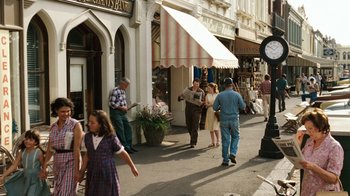 Movie still from “Charlotte's Web” (2006), directed by Gary Winick – A group of people walking down a street; Wide shot, High angle