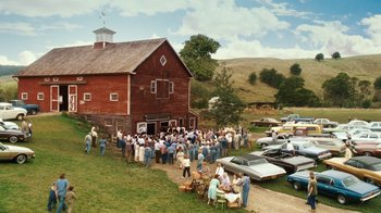 Movie still from “Charlotte's Web” (2006), directed by Gary Winick – A group of people standing outside of a red barn; Extreme Wide shot, High angle