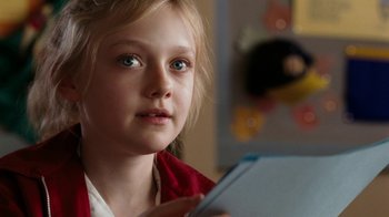Movie still from “Charlotte's Web” (2006), directed by Gary Winick – A young girl is holding a piece of paper; Close Up shot, Over the shoulder angle
