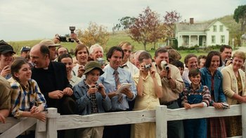 Movie still from “Charlotte's Web” (2006), directed by Gary Winick – A group of people taking pictures of a crowd of onlookers; Wide shot, High angle
