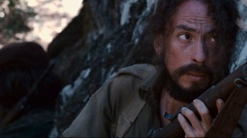 Movie still from “Che: Part Two” (2008), directed by Steven Soderbergh – A person with a beard; Close Up shot, Low angle