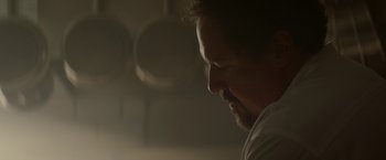 Movie still from “Chef” (2014), directed by Jon Favreau – A person looking down at his face; Close Up shot, Low angle
