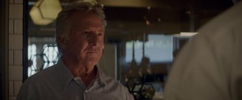 Movie still from “Chef” (2014), directed by Jon Favreau – An older man is looking into the distance; Close Up shot, Over the shoulder angle