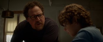 Movie still from “Chef” (2014), directed by Jon Favreau – A man and a boy are talking to each other; Close Up shot, Over the shoulder angle