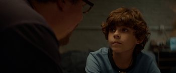 Movie still from “Chef” (2014), directed by Jon Favreau – A young man and a man with glasses looking at each other; Close Up shot, Over the shoulder angle