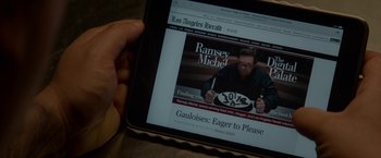 Movie still from “Chef” (2014), directed by Jon Favreau – A person holding a tablet in their hand; Extreme Close Up shot, Overhead angle