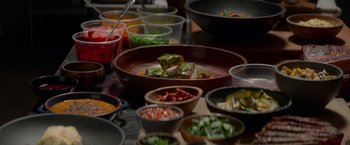 Movie still from “Chef” (2014), directed by Jon Favreau – A table filled with bowls of different types of food; Extreme Close Up shot, High angle