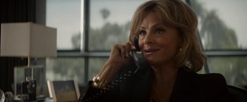 Movie still from “Chef” (2014), directed by Jon Favreau – A person talking on a cell phone; Close Up shot, Over the shoulder angle