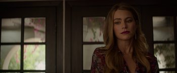 Movie still from “Chef” (2014), directed by Jon Favreau – A beautiful woman with long hair standing in front of a window; Close Up shot, Over the shoulder angle