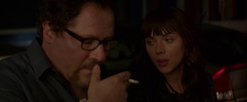 Movie still from “Chef” (2014), directed by Jon Favreau – A man and a woman are smoking a cigarette; Close Up shot, Over the shoulder angle