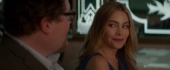 Movie still from “Chef” (2014), directed by Jon Favreau – A man and a woman sitting next to each other in a room; Close Up shot, Over the shoulder angle