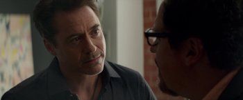 Movie still from “Chef” (2014), directed by Jon Favreau – Two men are talking to each other in front of a brick wall; Close Up shot, Over the shoulder angle