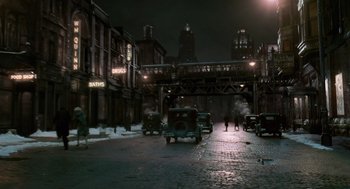 Movie still from “Chicago” (2002), directed by Rob Marshall – An image of a city street at night time; Extreme Wide shot, High angle