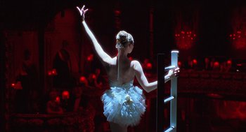 Movie still from “Chicago” (2002), directed by Rob Marshall – A woman in a blue dress is performing a dance; Medium shot, Low angle