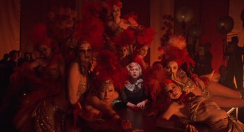 Movie still from “Chicago” (2002), directed by Rob Marshall – A group of women dressed up in costumes; Wide shot, High angle