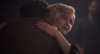 Movie still from “Chicago” (2002), directed by Rob Marshall – A man and a woman embracing each other; Close Up shot, Over the shoulder angle