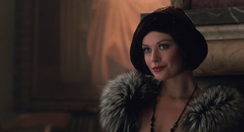Movie still from “Chicago” (2002), directed by Rob Marshall – A beautiful woman wearing a hat and a fur coat; Close Up shot, Over the shoulder angle