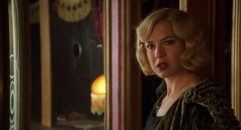 Movie still from “Chicago” (2002), directed by Rob Marshall – A woman standing in front of a mirror; Close Up shot, Over the shoulder angle