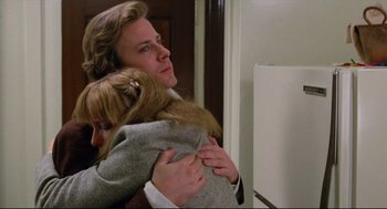 Movie still from “Chilly Scenes of Winter” (1979), directed by Joan Micklin Silver – A woman and a girl hug in a room; Close Up shot, Low angle