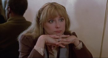 Movie still from “Chilly Scenes of Winter” (1979), directed by Joan Micklin Silver – A person with her hands near her face; Close Up shot, High angle