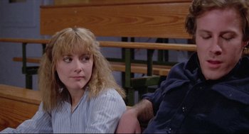 Movie still from “Chilly Scenes of Winter” (1979), directed by Joan Micklin Silver – A woman sitting next to a man on a bench; Close Up shot, Low angle