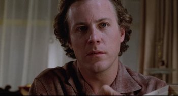 Movie still from “Chilly Scenes of Winter” (1979), directed by Joan Micklin Silver – A person wearing a brown shirt; Close Up shot, Low angle