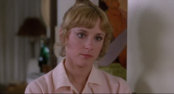 Movie still from “Chilly Scenes of Winter” (1979), directed by Joan Micklin Silver – A person wearing a pink shirt; Close Up shot, Over the shoulder angle