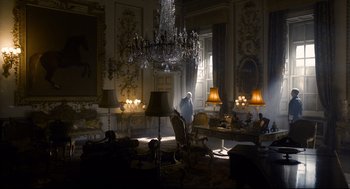 Movie still from “Darkest Hour” (2017), directed by Joe Wright – A room filled with lots of furniture and a large chandelier; Extreme Wide shot, Low angle