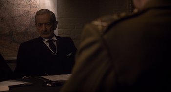 Movie still from “Darkest Hour” (2017), directed by Joe Wright – Close Up shot, Over the shoulder angle