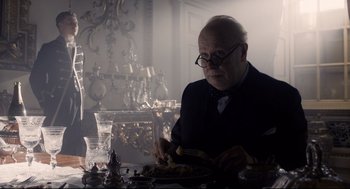 Movie still from “Darkest Hour” (2017), directed by Joe Wright – Medium shot, Low angle