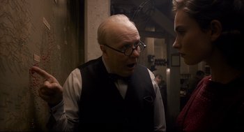 Movie still from “Darkest Hour” (2017), directed by Joe Wright – Close Up shot, Over the shoulder angle