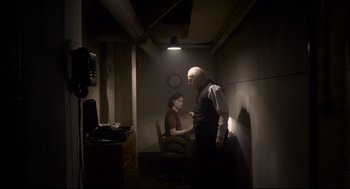 Movie still from “Darkest Hour” (2017), directed by Joe Wright – Medium shot, Over the shoulder angle