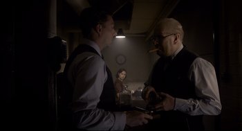 Movie still from “Darkest Hour” (2017), directed by Joe Wright – Medium shot, Over the shoulder angle