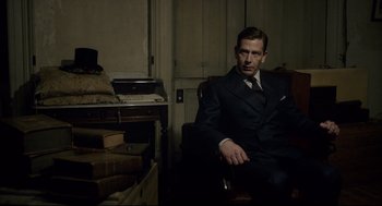 Movie still from “Darkest Hour” (2017), directed by Joe Wright – Medium shot, Over the shoulder angle