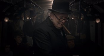 Movie still from “Darkest Hour” (2017), directed by Joe Wright – Medium shot, Low angle